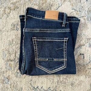 Buckle High Rise Flare Jeans